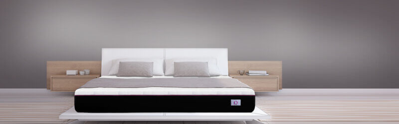 O Mattress in a bed on a modern bedroom