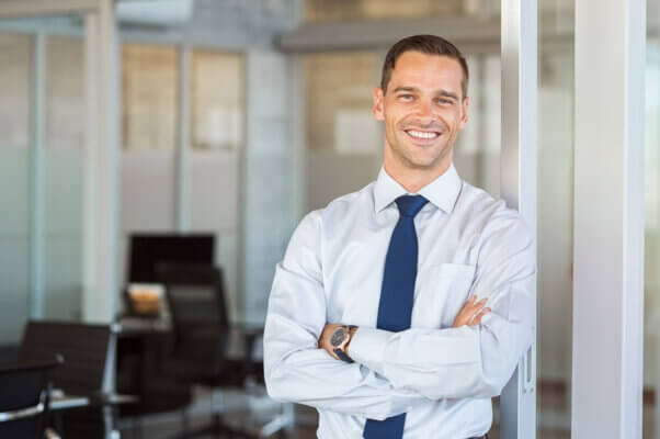 Smiling businessman at office