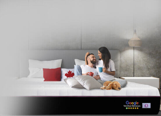 Couple Laying in the bed with Omni mattress